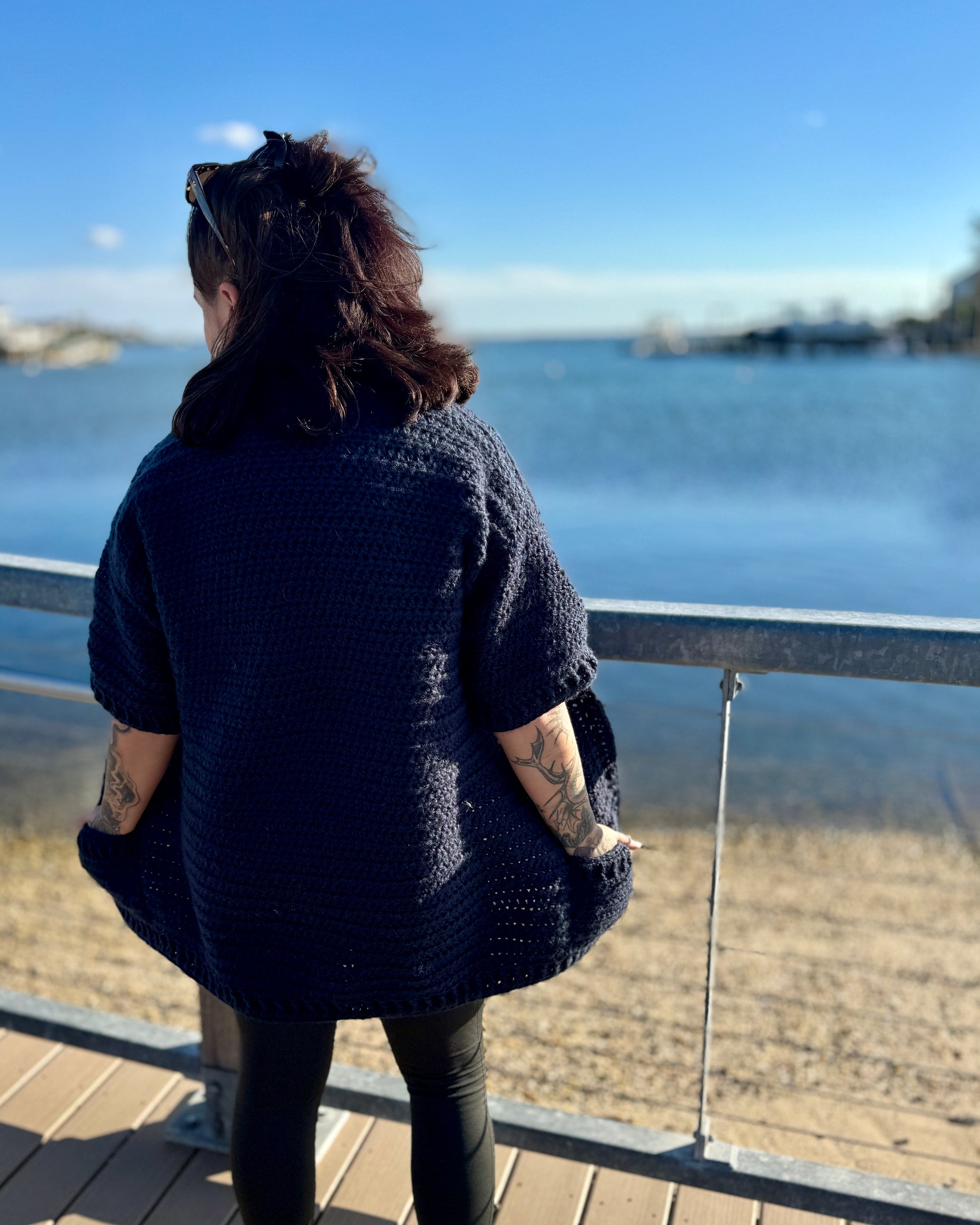 Back view of the Goose Island Cardigan showing relaxed drape and half sleeves.